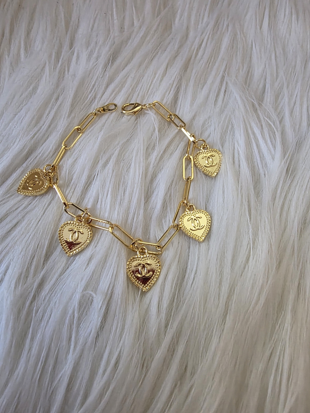 Gold Heart Charm Bracelet with Logo Medallions